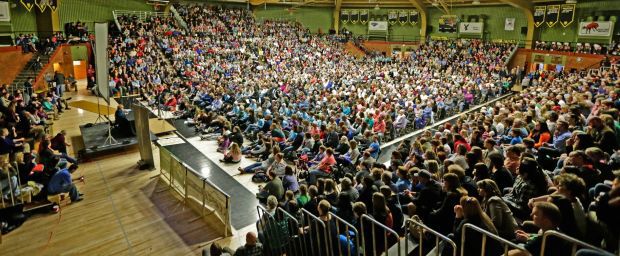 Eva Kor speaks to a packed gym